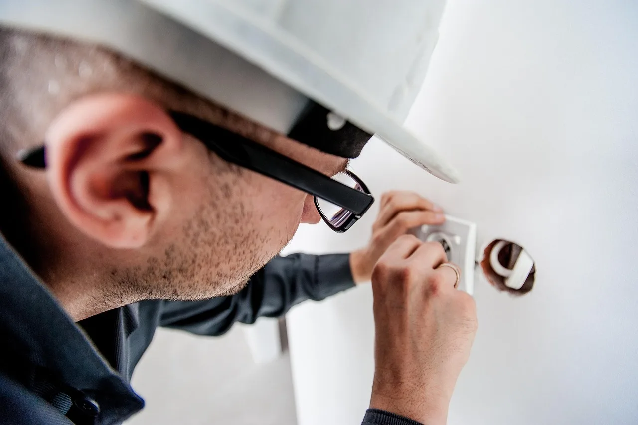 electrician, repair, electricity, socket, professional, electric, worker, builder, man, male, helmet, work, electrician, electrician, electrician, electrician, electrician, repair, electricity, electricity, worker, work. What Does It Cost to Run Electricity to a Backyard Office?