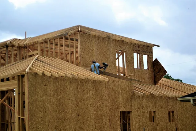 home, builder, construction, architecture, frame, hard work, residential, property, residence, suburban, exterior, working, development, wood, roofing, contractor nail gun, roof, free construction industry pictures, 2023, 2024, construction site photography, editors pic, employment, contractors, drilling into wood. 5 pointers on studio shed construction that hold up