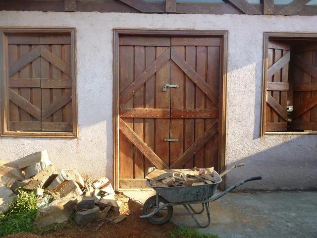 workshop, shed, stable, wheelbarrow, shutters, rustic, doors, windows, brown door. Which studio shed upgrades add value you feel every day, in plain terms